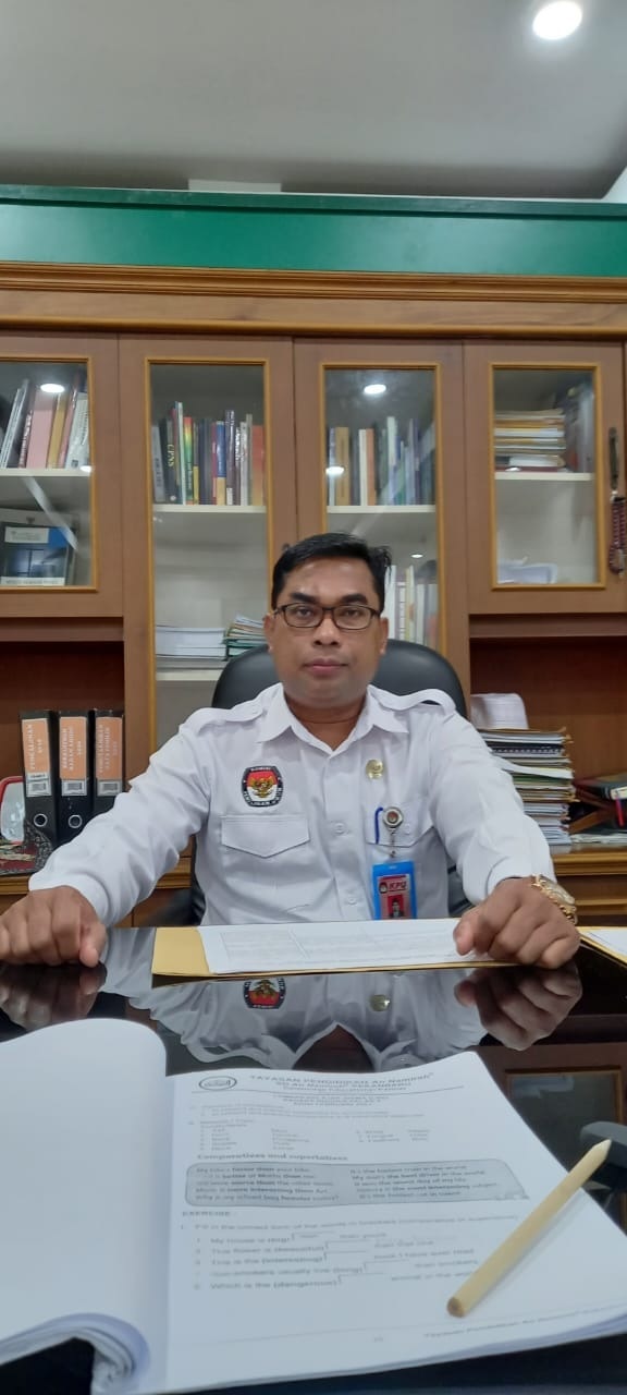 Ktua KPU Riau Ilham Muhammad Yasir